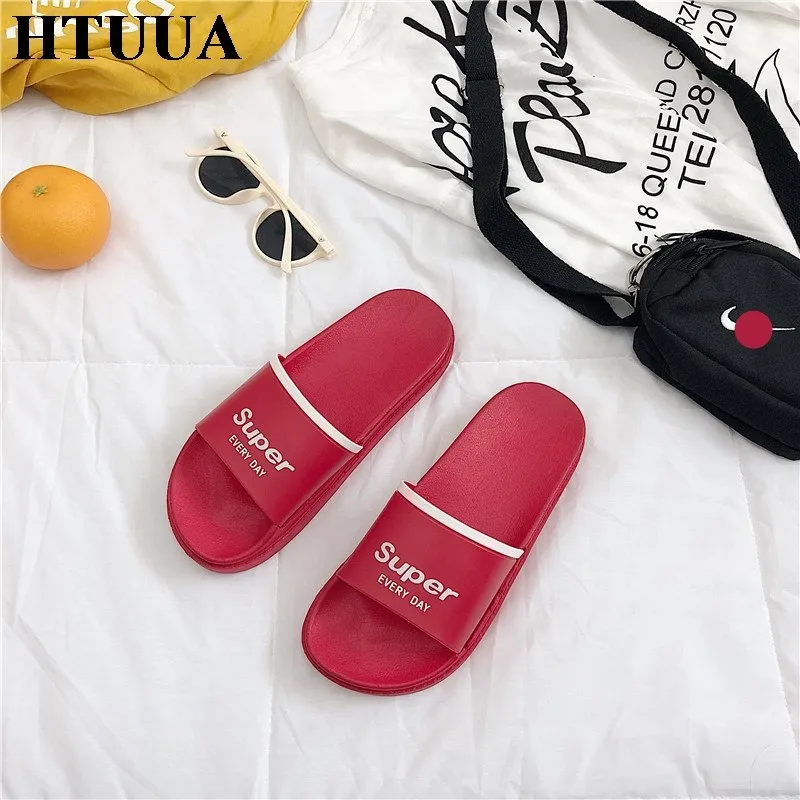 HTUUA 2018 Summer Shoes Chic Letters Slippers Women Korean Candy color Flat Slides Outdoor Indoor Bathroom Home Slippers SX1550